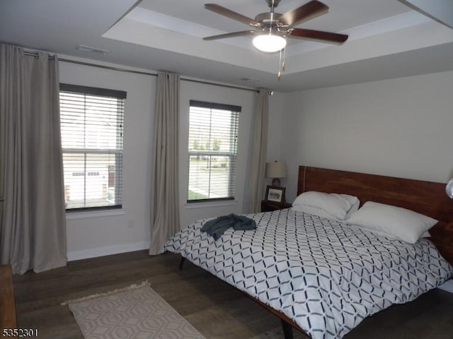 3 Sierra Pl, Sparta Twp, NJ 07871 - bedroom featuring visible vents, multiple windows, wood finished floors, and a tray ceiling
