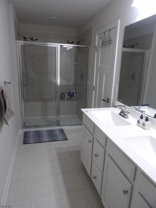 3 Sierra Pl, Sparta Twp, NJ 07871 - bathroom with tile patterned flooring, a sink, a shower stall, and double vanity