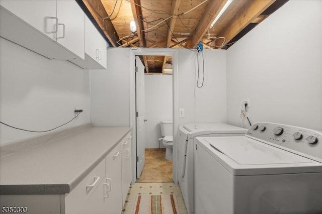 laundry area featuring laundry area and independent washer and dryer