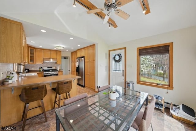 dining area with recessed lighting, rail lighting, ceiling fan, and lofted ceiling