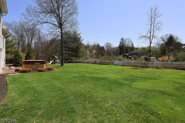 82 Queen Anne Dr, Bernards Twp, NJ 07920 - view of yard with a fenced backyard and a hot tub