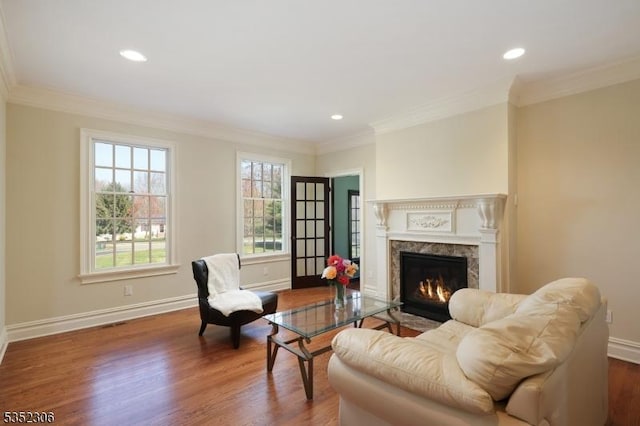 82 Queen Anne Dr, Bernards Twp, NJ 07920 - living area with recessed lighting, wood finished floors, ornamental molding, baseboards, and a fireplace