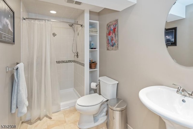 full bath with visible vents, toilet, recessed lighting, a shower stall, and a sink