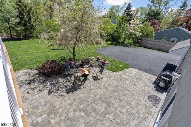 view of patio featuring a fire pit