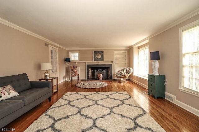 1775 Sleepy Hollow Ln, Plainfield City, NJ 07060 - living room featuring crown molding, wood finished floors, baseboards, and a fireplace