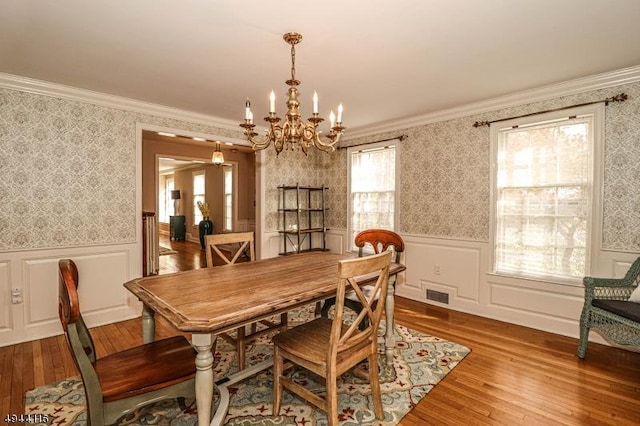 1775 Sleepy Hollow Ln, Plainfield City, NJ 07060 - dining room with wallpapered walls, a chandelier, hardwood / wood-style flooring, crown molding, and wainscoting