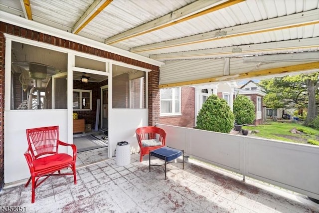 view of patio / terrace with a sunroom