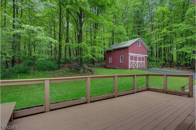 58 Water St, Tewksbury Twp, NJ 08833 - wooden deck featuring a barn, a view of trees, a detached garage, an outbuilding, and a lawn