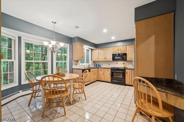 kitchen featuring black appliances, a sink, light tile patterned floors, tasteful backsplash, and a baseboard radiator