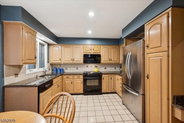 kitchen with black appliances, light brown cabinetry, a sink, tasteful backsplash, and light tile patterned flooring