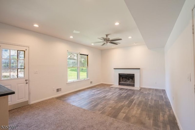 unfurnished living room featuring visible vents, recessed lighting, ceiling fan, and baseboards
