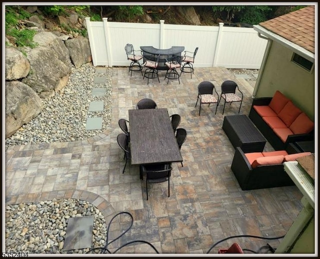view of patio / terrace with fence and outdoor dining area