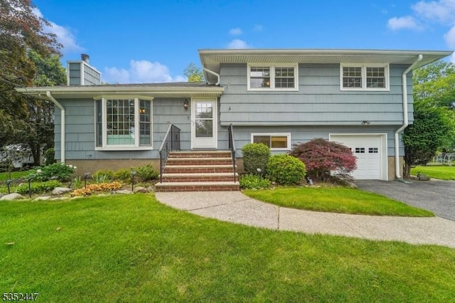 7 Swan Ter, Wayne Twp, NJ 07470 - tri-level home with a front yard, an attached garage, a chimney, and driveway