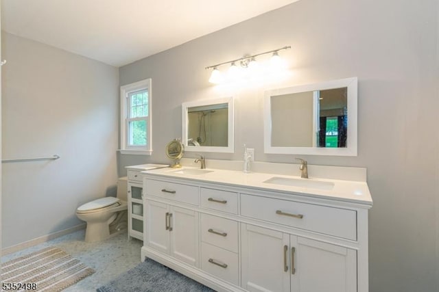 8 Kevin Dr, Mount Olive Twp, NJ 07836 - bathroom with double vanity, toilet, and baseboards