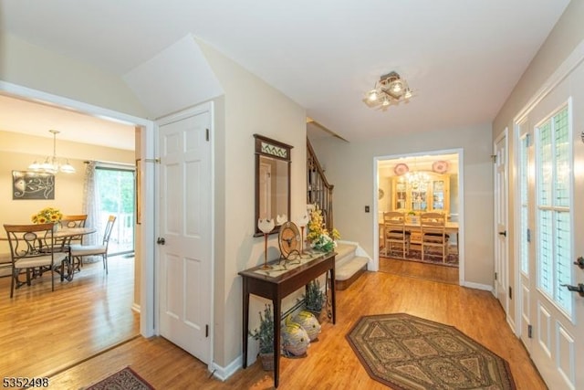8 Kevin Dr, Mount Olive Twp, NJ 07836 - entryway with a chandelier, light wood finished floors, and baseboards