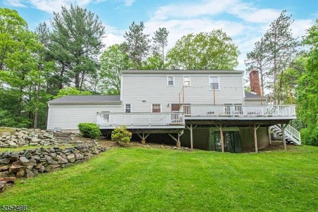 8 Kevin Dr, Mount Olive Twp, NJ 07836 - rear view of property featuring a deck, a yard, and stairway