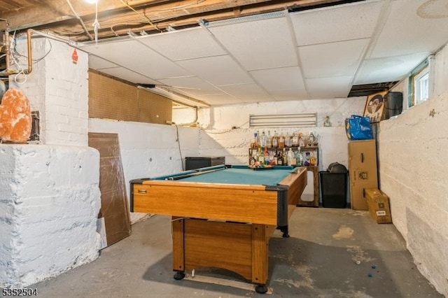 recreation room with billiards and unfinished concrete floors
