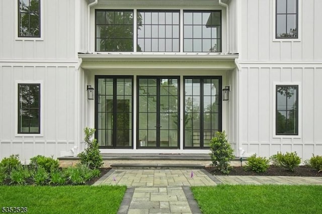 2 Spenser Dr, Millburn Twp, NJ 07078 - doorway to property featuring board and batten siding