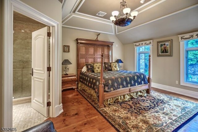 770 Pottersville Rd, Chester Twp, NJ 07931 - bedroom with multiple windows, a chandelier, wood finished floors, and vaulted ceiling