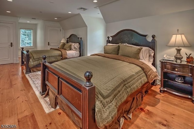 770 Pottersville Rd, Chester Twp, NJ 07931 - bedroom with light wood-style flooring, recessed lighting, and lofted ceiling
