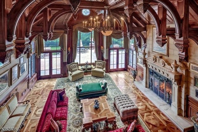 770 Pottersville Rd, Chester Twp, NJ 07931 - living area featuring french doors, a fireplace, and a chandelier