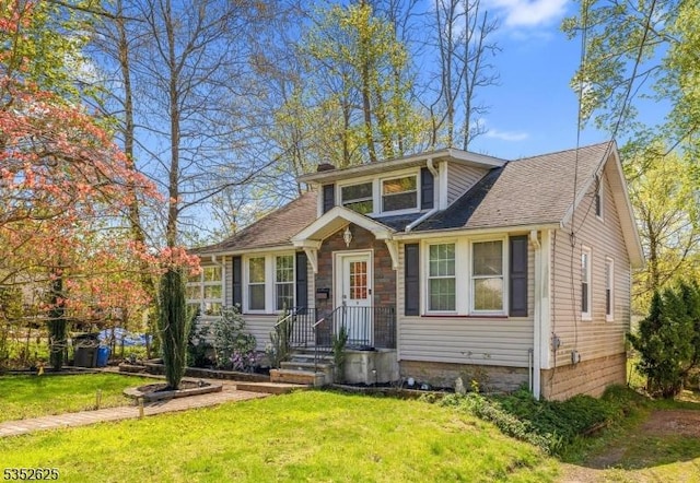 bungalow-style home with a front lawn and a chimney