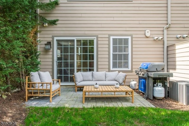 exterior space with area for grilling, central AC, and an outdoor living space