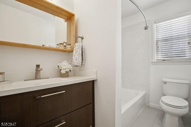 bathroom featuring vanity, tile patterned floors, bathing tub / shower combination, and toilet