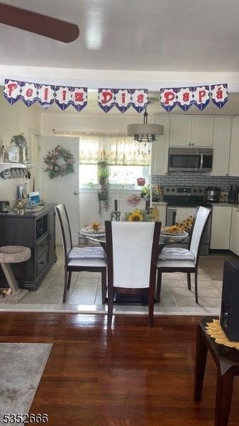 dining area featuring plenty of natural light and light wood-style floors
