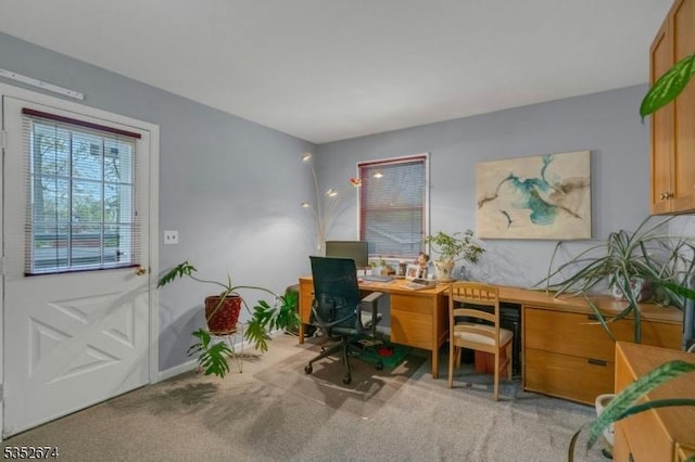 view of carpeted office space