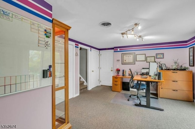 office with carpet floors and visible vents