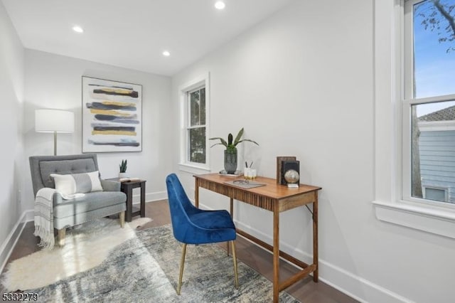 office featuring baseboards, wood finished floors, and recessed lighting