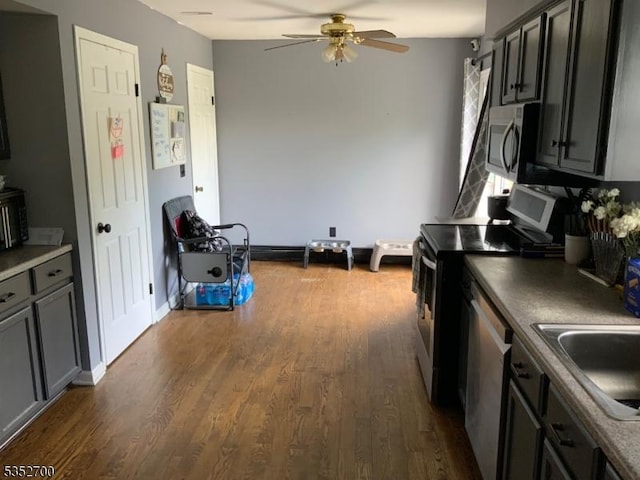 19 Southfield Dr, Sussex Boro, NJ 07461 - kitchen with stainless steel appliances, a ceiling fan, dark wood-style flooring, a sink, and baseboards