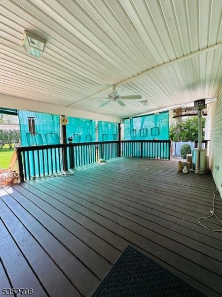 deck featuring ceiling fan