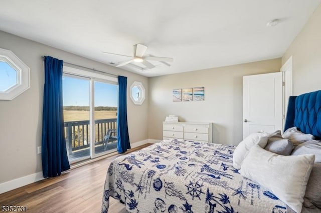 bedroom featuring access to outside, baseboards, ceiling fan, and light wood-style flooring