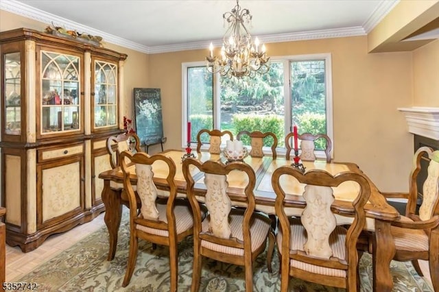 dining space with an inviting chandelier and crown molding