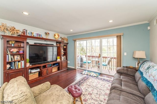 living room with ornamental molding, recessed lighting, and wood finished floors