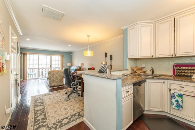 kitchen featuring a sink, visible vents, a peninsula, stainless steel dishwasher, and open floor plan