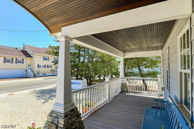 2210 Atlantic Ave, Long Beach Twp, NJ 08008 - wooden deck featuring a porch