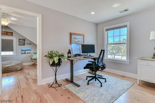 2210 Atlantic Ave, Long Beach Twp, NJ 08008 - office featuring visible vents, light wood-style flooring, ceiling fan, and baseboards