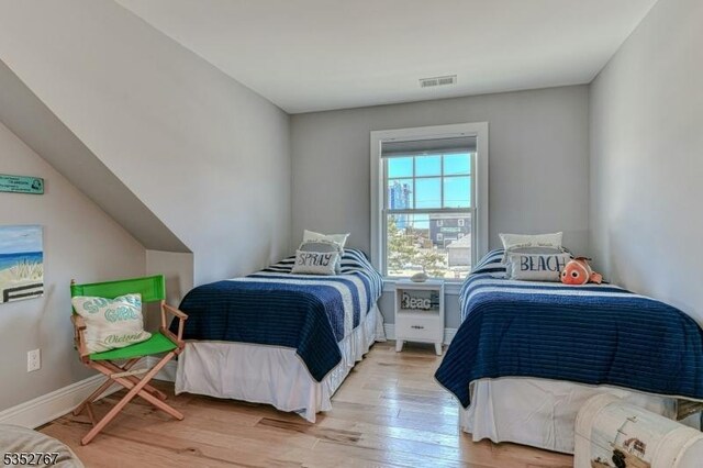 2210 Atlantic Ave, Long Beach Twp, NJ 08008 - bedroom with wood finished floors and visible vents