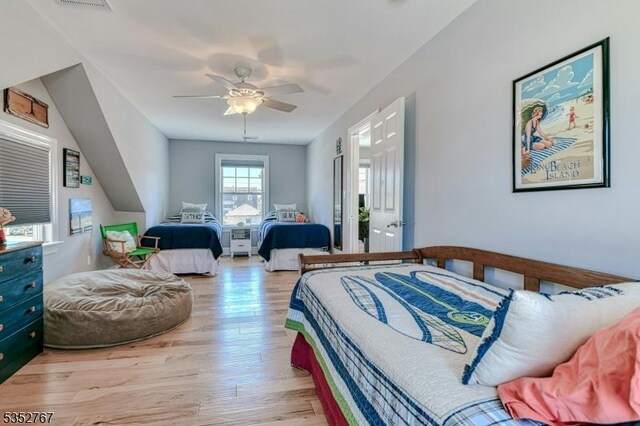 2210 Atlantic Ave, Long Beach Twp, NJ 08008 - bedroom featuring light wood-style floors and a ceiling fan