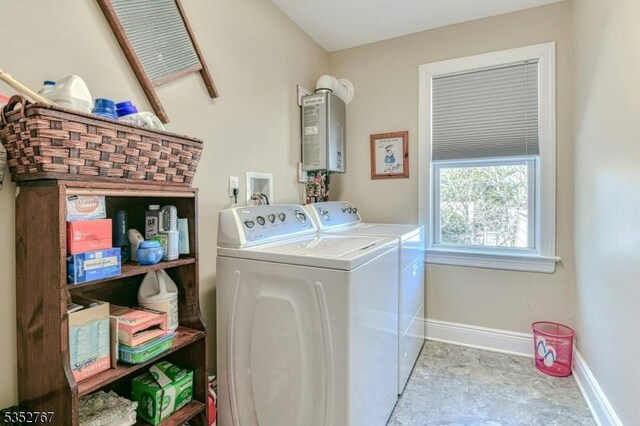 2210 Atlantic Ave, Long Beach Twp, NJ 08008 - washroom featuring water heater, baseboards, laundry area, and independent washer and dryer