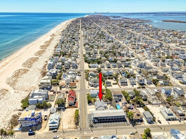2210 Atlantic Ave, Long Beach Twp, NJ 08008 - aerial view featuring a view of the beach, a residential view, and a water view