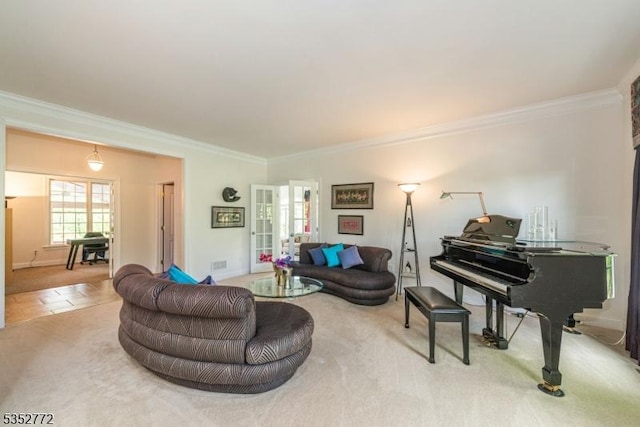 living room featuring ornamental molding, plenty of natural light, carpet floors, and french doors