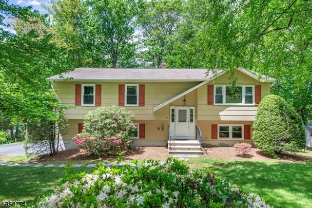 11 Ginger Ln, Sparta Twp, NJ 07871 - bi-level home with a chimney and a front lawn
