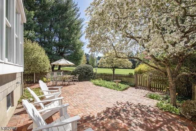 199 W Springtown Rd, Washington Twp, NJ 07853 - fenced backyard with a patio area and outdoor dining space