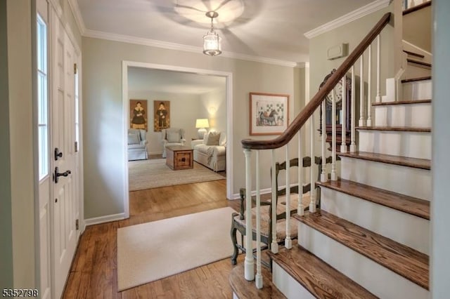 199 W Springtown Rd, Washington Twp, NJ 07853 - entryway with stairs, wood finished floors, crown molding, and baseboards