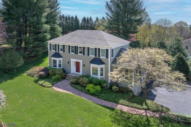 199 W Springtown Rd, Washington Twp, NJ 07853 - colonial home featuring a front lawn and a shingled roof