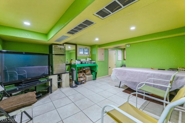 bedroom featuring light tile patterned floors, recessed lighting, and visible vents